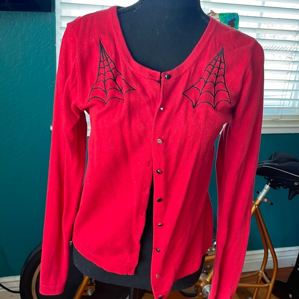 Red web cardigan Sourpuss
